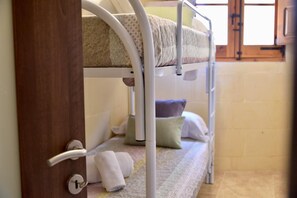 Family Room | Frette Italian sheets, premium bedding, individually furnished