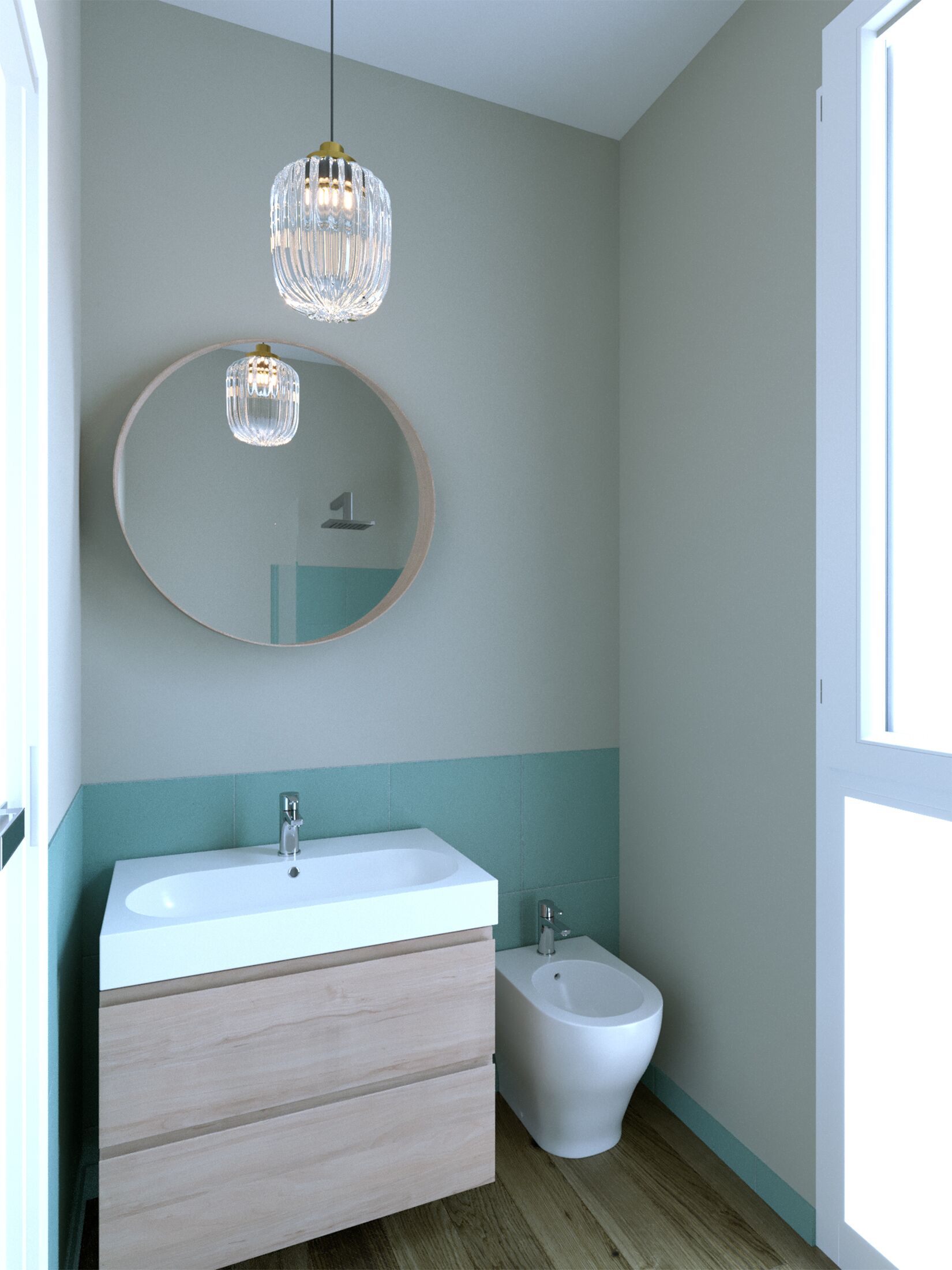 A bathroom with a white sink, a bidet, and two pendant lights.