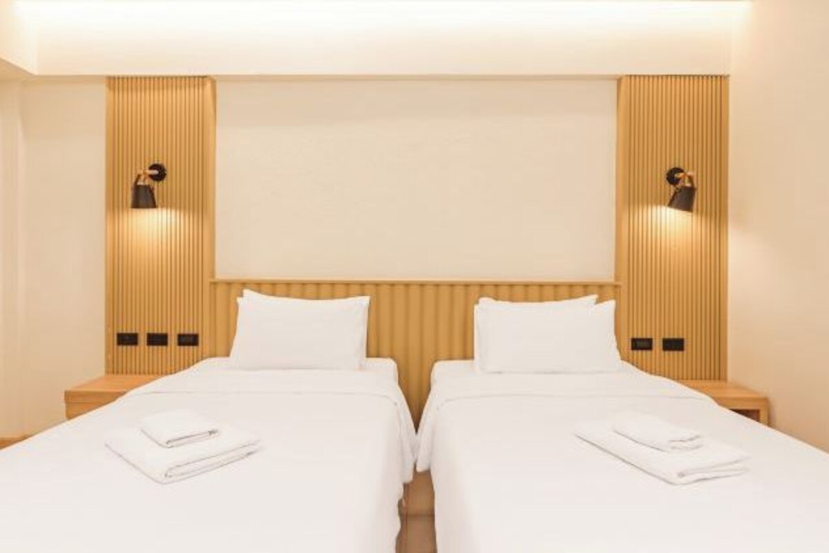 Blackout drapes, WiFi (free), bed sheets