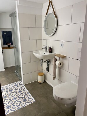 Shower, towels, soap, shampoo