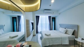 Suite estudio empresarial, 1 cama Queen size, para no fumadores | Ropa de cama de alta calidad y decoración personalizada