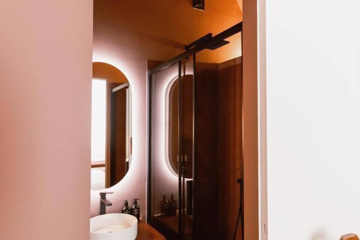 Designer toiletries, hair dryer, bathrobes, slippers