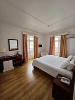 Desk, laptop workspace, free WiFi, bed sheets