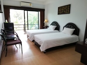 Habitación básica con 2 camas individuales, 1 habitación, para no fumadores, junto a la alberca | Cortinas blackout, wifi gratis y ropa de cama 