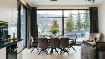 Comfort Chalet | Living area | 49-inch flat-screen TV with digital channels, fireplace