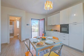 Appartement Standard, plusieurs chambres (Le Bianche Apt 2 with Garden near The) | Restauration