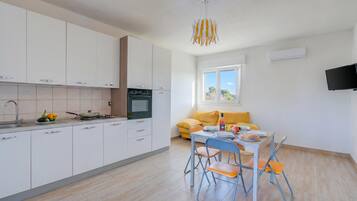 Standard Apartment, 2 Bedrooms, Air conditioning (Le Bianche Apt 2 with Garden near The) | Dining