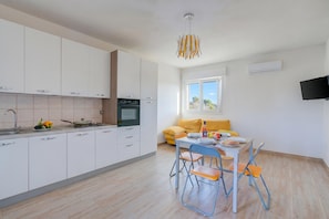 Standard Apartment, 2 Bedrooms, Air conditioning (Le Bianche Apt 2 with Garden near The) | Dining