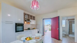 Standard Apartment, 2 Bedrooms (Le Bianche Apt1 with Garden Near The) | Dining - Le Bianche Apt 2 with Garden near The Sea (Manduria)