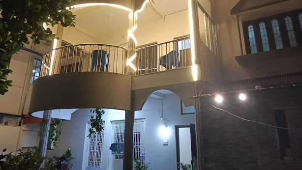 A multi-story building with balconies, a central courtyard, and a traditional architectural style. - HOTEL BHUBANESWAR PRIDE (Bhubaneshwar)
