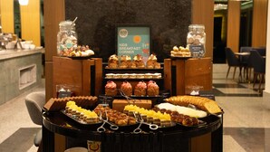 A breakfast buffet with various pastries and desserts. - Radisson Residences Cairo Heliopolis (Cairo)
