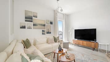 Executive Apartment | Living area | 50-inch Smart TV with digital channels