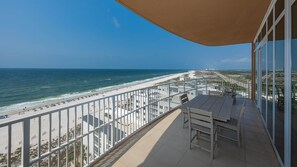 A balcony with a view of the beach and ocean. - Phoenix Gulf Towers 901 4 Bedroom Condo (Orange Beach)
