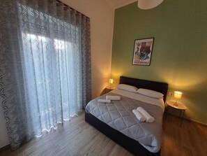 2 habitaciones, tabla de planchar con plancha, wifi y ropa de cama