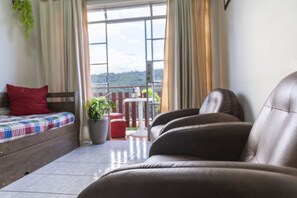 Apartment | Living area - Apartamento aconchegante. Vista incrível (Águas de Lindóia)