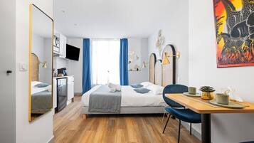 Estudio Confort | Minibar, cortinas blackout y insonorización