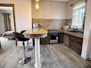 Apartment | Private kitchen | Fridge, microwave, oven, stovetop