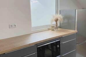 Réfrigérateur, micro-ondes, four, lave-vaisselle