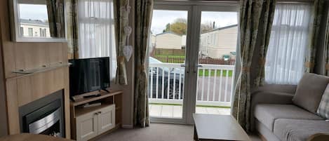 Ferienhaus | Wohnbereich | Flachbildfernseher, Kamin