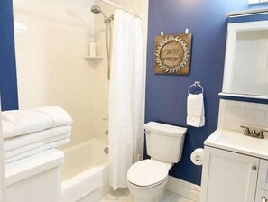 Hair dryer, towels, soap, shampoo