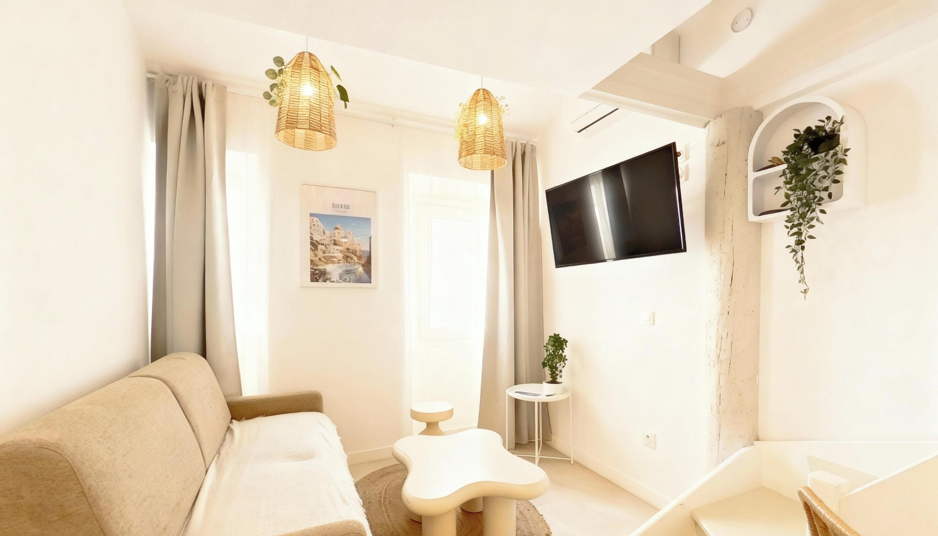 SAMOS/MILOS/SYMI/RHODES | Living area | 107-cm flat-screen TV with cable channels, Netflix, pay films