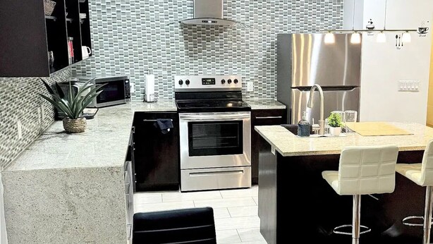 Coffee/tea maker, fridge, microwave, oven - Posh 2BR/2BA King Bed! Free Parking! 30 Min to NYC

 (East Orange)