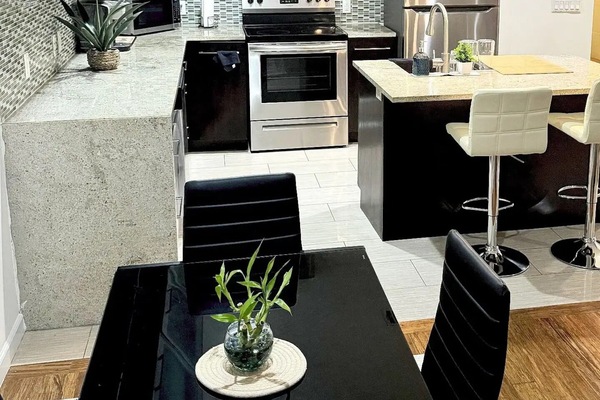 Coffee/tea maker, fridge, microwave, oven