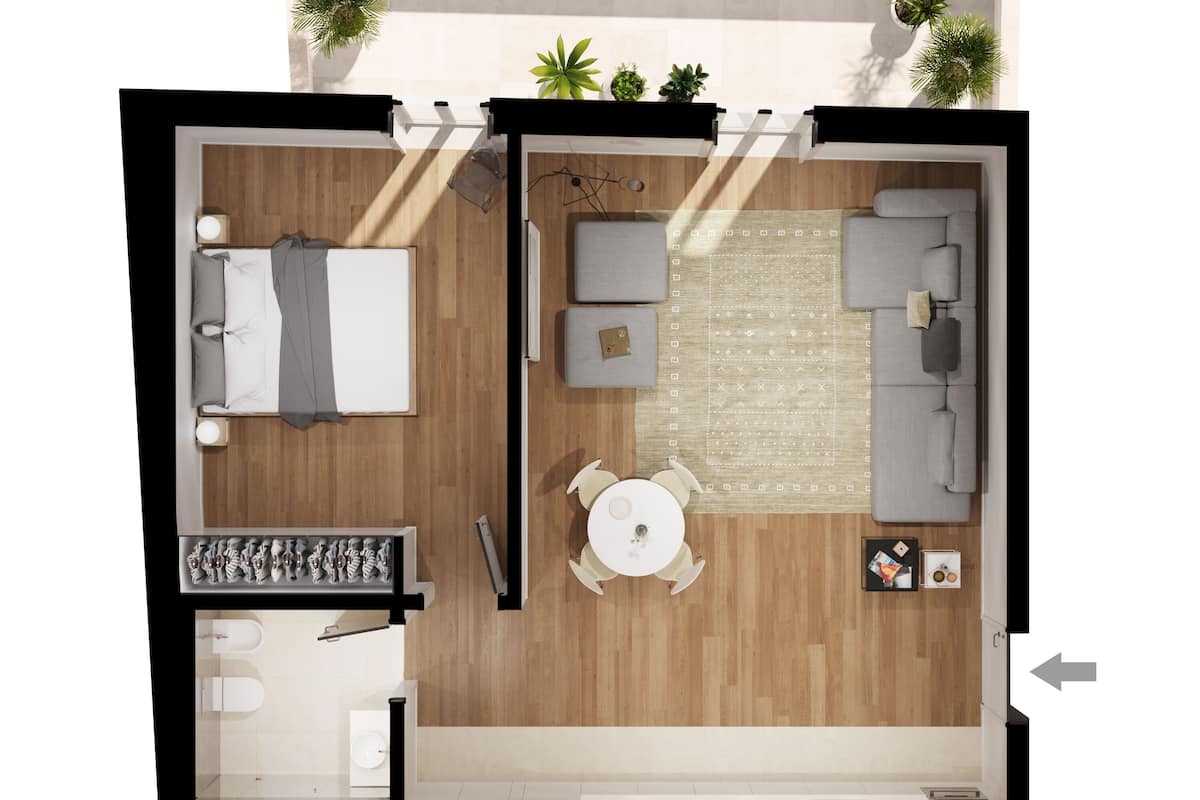 Un appartement de deux chambres comprenant un salon, un coin repas, une cuisine et un balcon.
