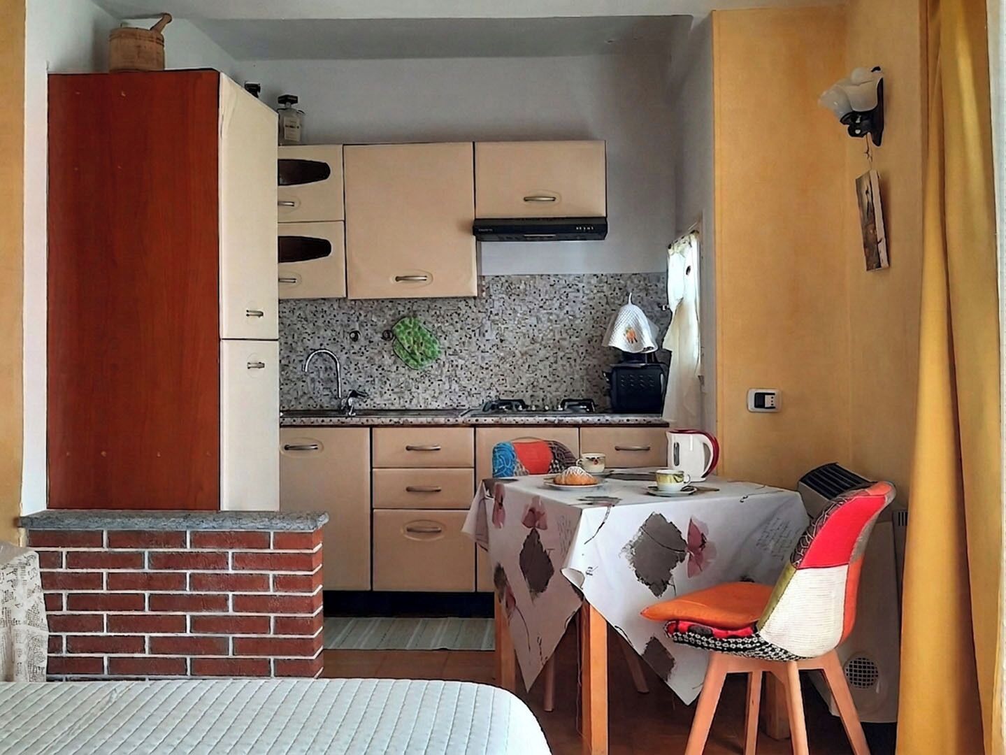 Fridge, stovetop, electric kettle, cookware/dishes/utensils