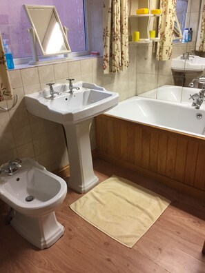 Separate bathtub and shower, deep-soaking bathtub, rainfall showerhead