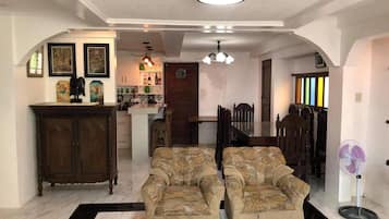 Signature House, 2 Bedrooms, Non Smoking | Living room | 43-inch Smart TV with digital channels