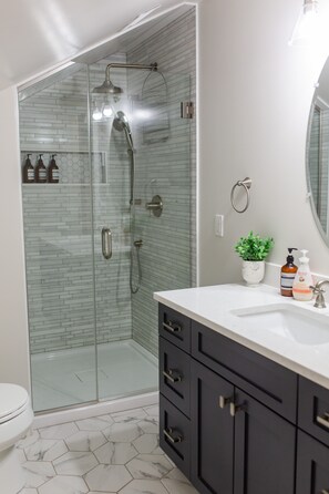 Shower, hair dryer, towels, soap