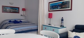 1 bedroom, desk, iron/ironing board, travel cot