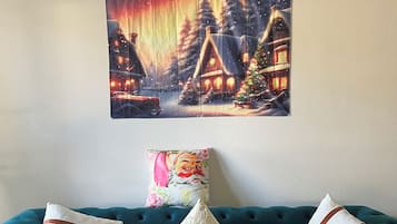 Smart TV, fireplace, books, computer monitors