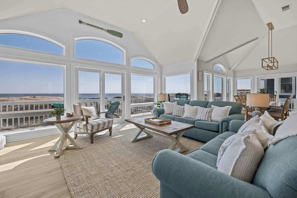 The living room has a smart TV and great ocean view!