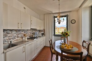 Fridge, dishwasher, coffee/tea maker - Panorama al Porto by Theater Home - directly on the port of Gargnano with marvellous lake view (Gargnano)