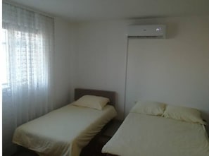 3 quartos, ferros/tábuas de passar roupa, berço de viagem, Wi-Fi