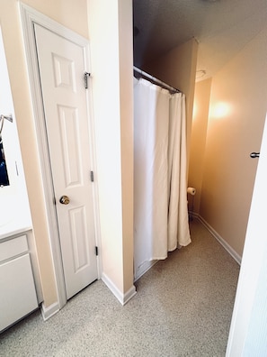 Shower, towels, soap, toilet paper