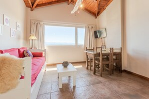 Apartment, 1 Bedroom, Lake View | Living area | 43-inch Smart TV with digital channels, Netflix, pay films - Apartments Bariloche - Downtown, Mitre (San Carlos de Bariloche)