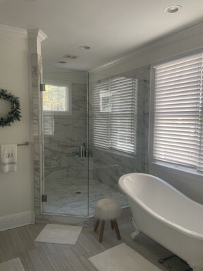 Shower, towels, soap, toilet paper