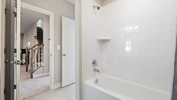 Shower, hair dryer, towels, shampoo