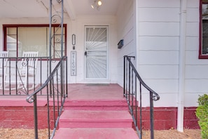 A front porch with a red carpet leading to a white door marked "WELCOME". - 5 Mi to Downtown & Red Mtn Park! Cozy Family Home (Birmingham)