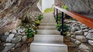 Unclassified image, 5 of 32, button - Artsy Riverfront Jungle Retreat: River Pool & Hot Tub in living room (Rivas)