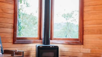 Romantic Chalet | Living area | 32-inch Smart TV with digital channels, fireplace