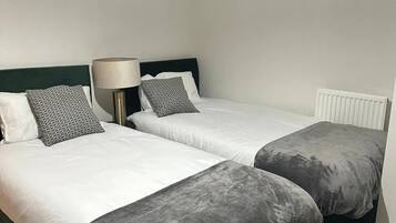 2 habitaciones, tabla de planchar con plancha y wifi gratis