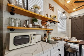 Microwave, coffee/tea maker, cookware/dishes/utensils