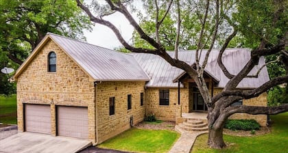Riverfront home on Lake Seguin with dock, kayaks, beautiful views & air hockey
