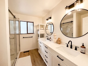 Shower, hair dryer, towels, soap