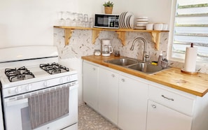 Comfort Villa, 3 Bedrooms, Private Pool, Lagoon View | Private kitchen | Full-size fridge, microwave, coffee/tea maker, toaster - Palmeras Beach Apartments (Guanica)