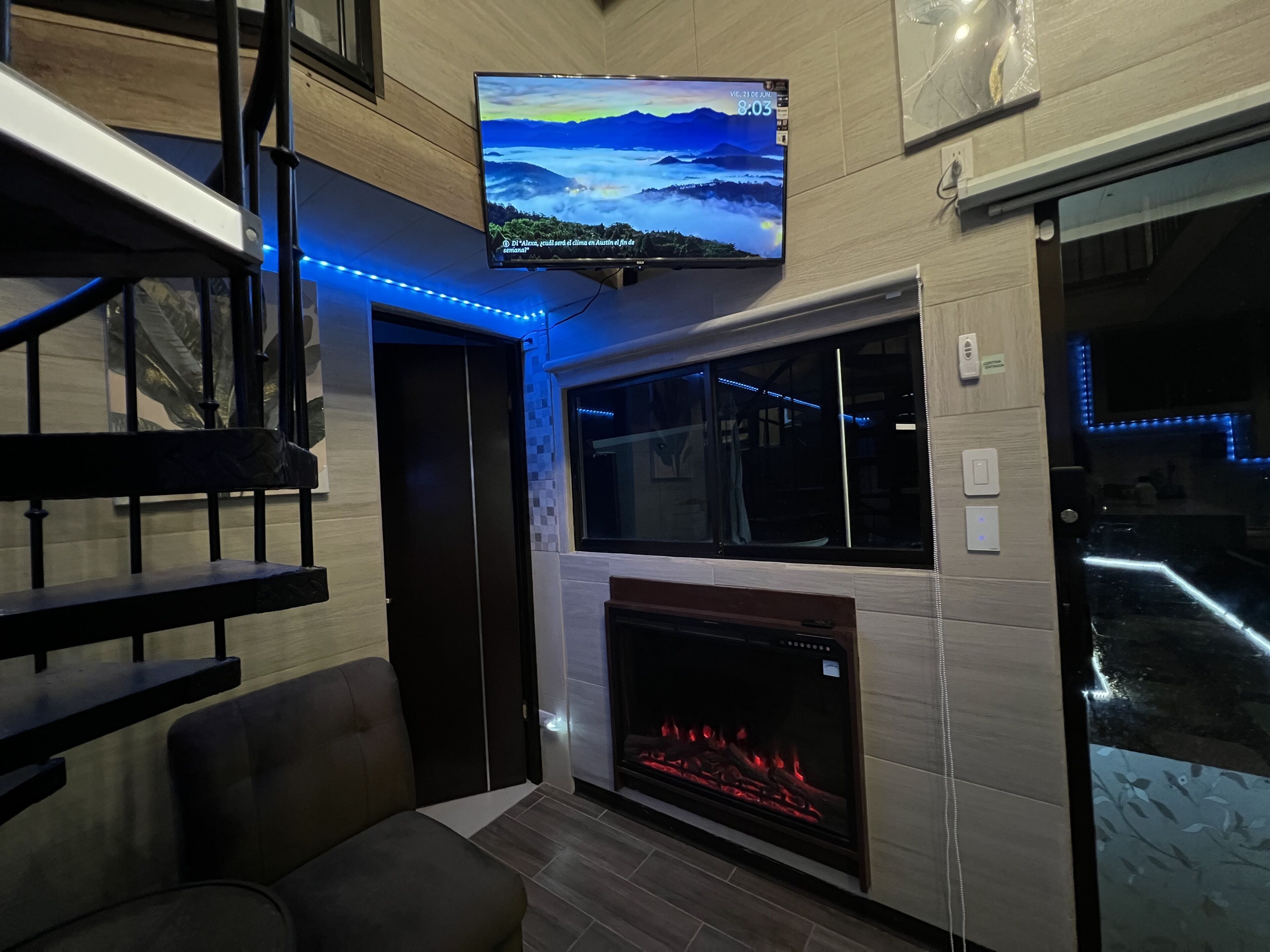 42-inch LED TV with digital channels, fireplace, video-game console